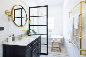 Gold accents have been gracing the most enviable bathrooms since, well, forever