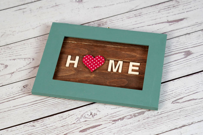 It’s the little things that make a place feel like home, that give it character and style, things like the framed pictures on the shelves or the decorations that adorn the wall