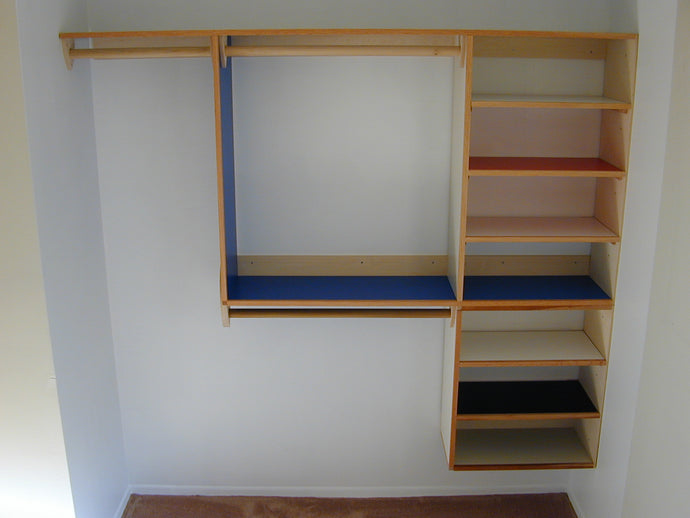 Inventor and designer develops new closet rod and shelf support system